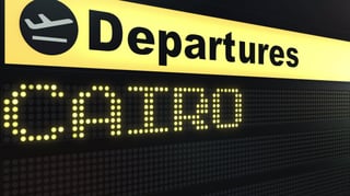 Flight To Cairo On International Airport Departures Board Travelling To Egypt Conceptual