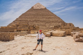 Happy Tourist Girl And Pyramid Of Giza In Cairo Egypt