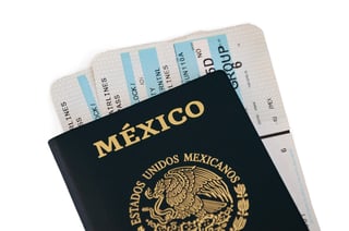 Mexican Passport With Two Plain Tickets Inside Vacation Concept Isolated On White Background