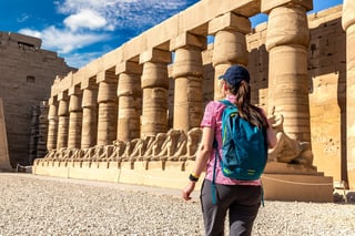 Woman Tourist At Karnak Temple In A Sunny Day Luxor Egypt