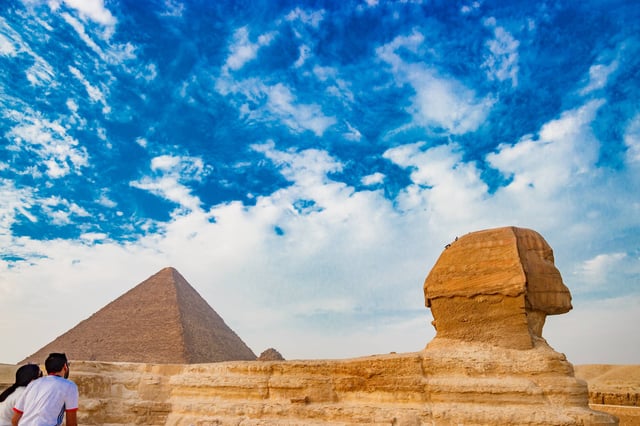 Admiring The Sphinx In Cairo
