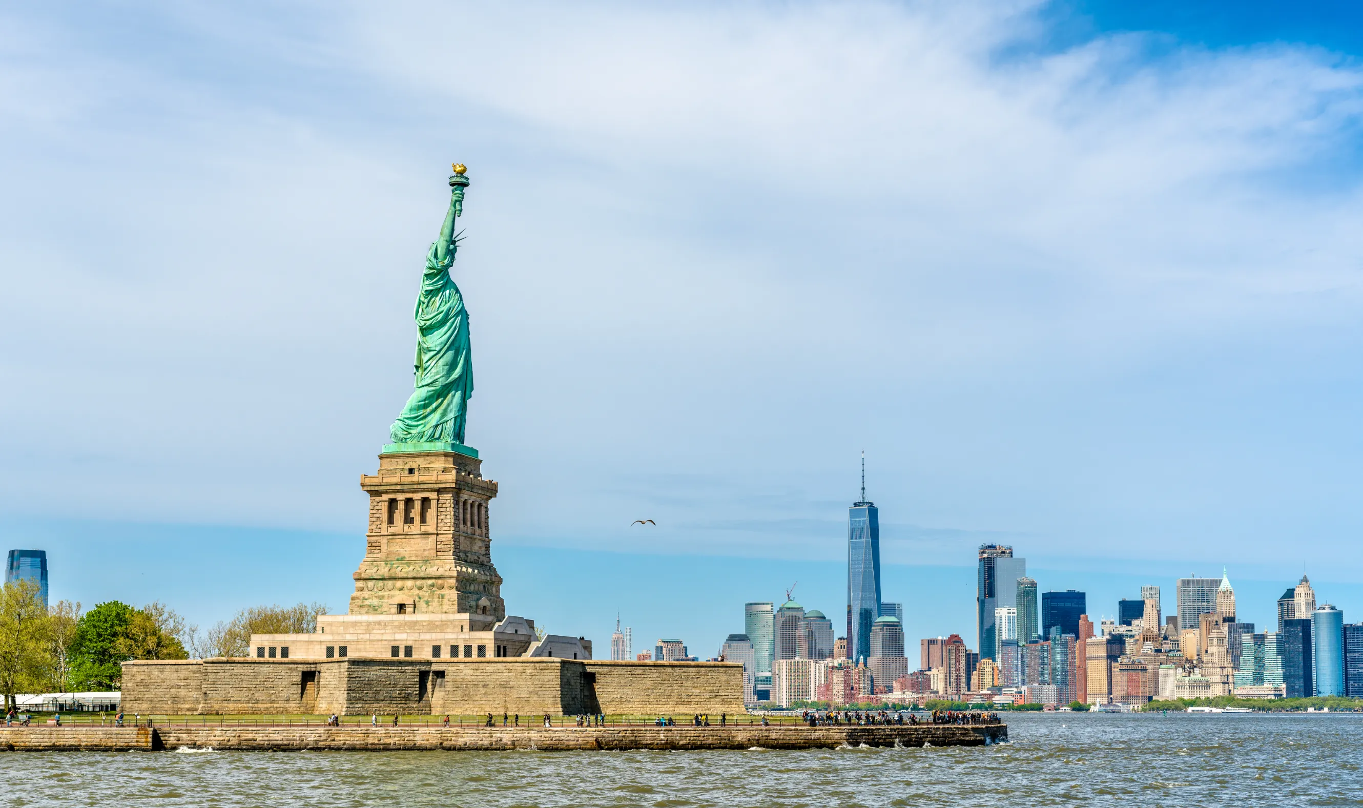 statue of liberty and manhattan new york city