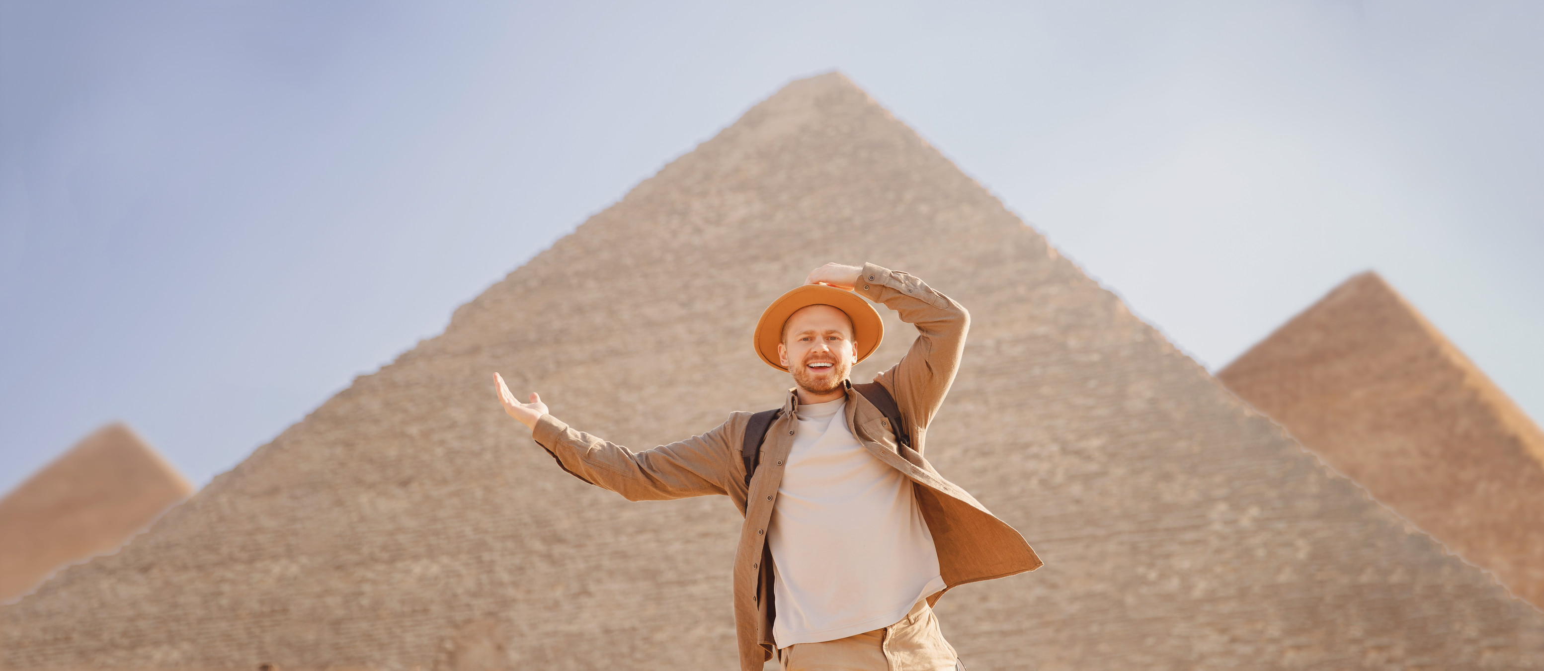 Tourist photo with Pyramids in Background
